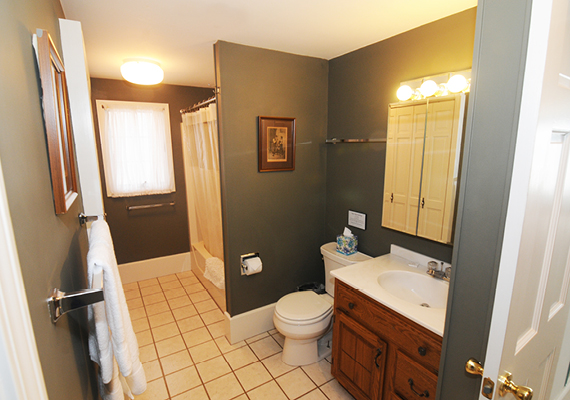 Waterfront 3+ Bed, 2 Bath Apartment. Includes waterfront balcony with seating for 4, fully stocked kitchen, full dining room seating for 8, full living room with harbor and beach views, media room with fireplace, air conditioning and heating, WiFi, iHome, Comcast TV/DVD.