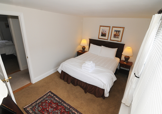 Waterfront 3+ Bed, 2 Bath Apartment. Includes waterfront balcony with seating for 4, fully stocked kitchen, full dining room seating for 8, full living room with harbor and beach views, media room with fireplace, air conditioning and heating, WiFi, iHome, Comcast TV/DVD.